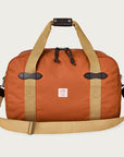 filson tin cloth small duffle bag rust