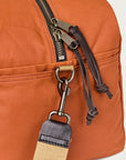 filson tin cloth small duffle bag rust