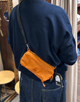topologie bottle sacoche medium burn orange ripstop and utility sling black