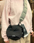 topologie reversible bucket black and puffer strap moss