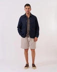 universal works pleated track short kennedy stripe brown