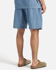 universal works pleated track short washed indigo chambray
