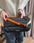 topologie bottle sacoche large puffer black and utility sling orange