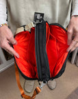 topologie bottle sacoche large puffer black and utility sling orange