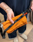 topologie bottle sacoche medium burn orange ripstop and utility sling black